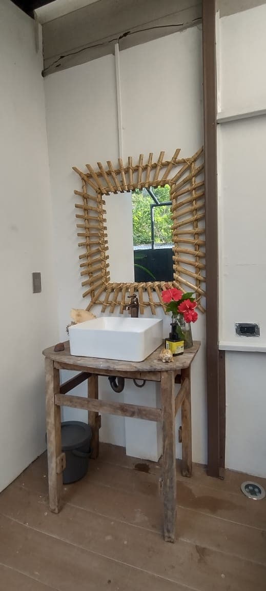 Bathroom — bamboo mirror and vintage sink